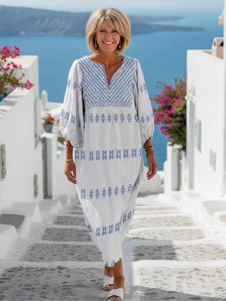 Evadne | Elegant and refined long dress with long sleeves, V-neck, and delicate embroidery